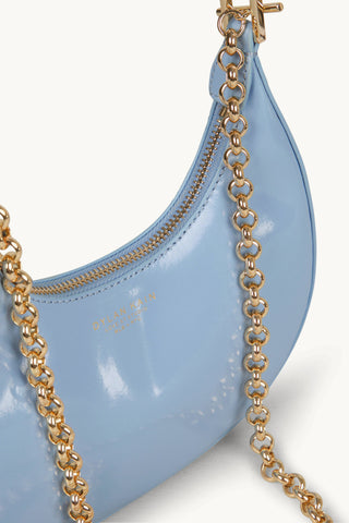 The Rhea Sling Patent Bag Cornflower